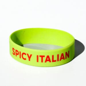 Green bracelet with "Spicy Italian" text.