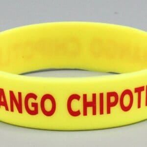 Yellow wristband with "Mango Chipotle" text.