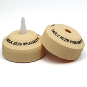 Garlic herb vinaigrette bottle caps.