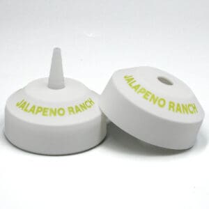 Jalapeno Ranch bottle caps on display.