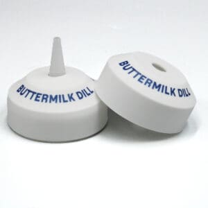 Buttermilk Dill container lids on display.