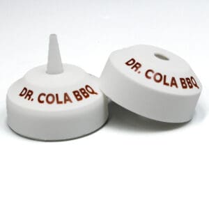 Dr. Cola BBQ bottle caps, white background.