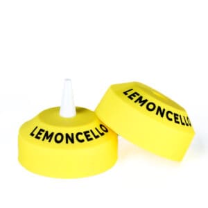 Two yellow Lemoncello juggling tops.