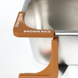 Brown rice container with orange corner labels.