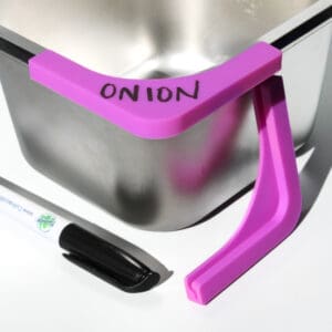 Purple corner protector labeled "onion" on container.