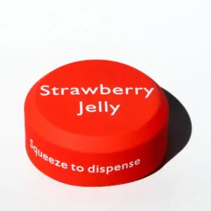 Red strawberry jelly cap, squeeze to dispense.