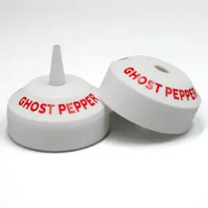 Ghost pepper bottle caps on display.