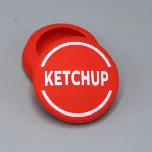Red ketchup lid with white lettering.