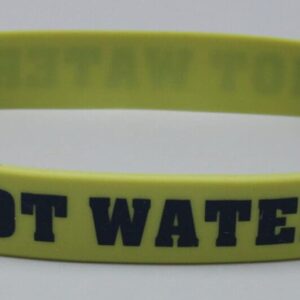 Yellow wristband with "Hot Water" text.