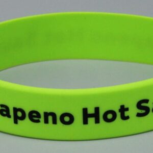 Lime green wristband, "Jalapeno Hot Sauce" text.