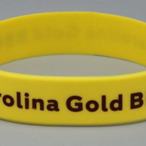Yellow wristband with "Carolina Gold BBQ" text.