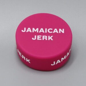 Pink container labeled "Jamaican Jerk" seasoning.