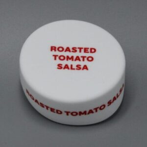 Round container labeled "Roasted Tomato Salsa.