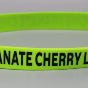 Green wristband with "POMEGRANATE CHERRY LIMEADE" text.