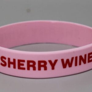 Pink wristband with "Sherry Wine" text.