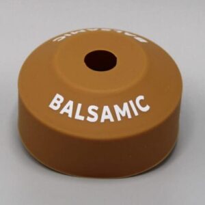 Brown balsamic bottle cap with hole.