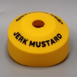 Yellow puck labeled "Jerk Mustard".