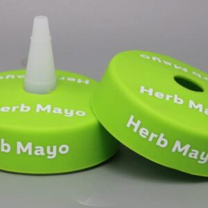 Green "Herb Mayo" bottle caps on display.