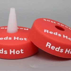 Red bottle caps with "Reds Hot" text.