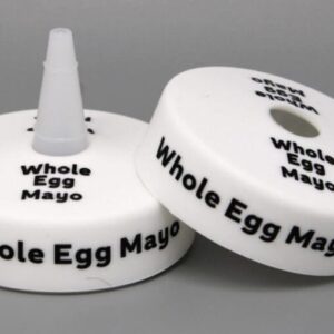 Whole Egg Mayo bottle caps on display.