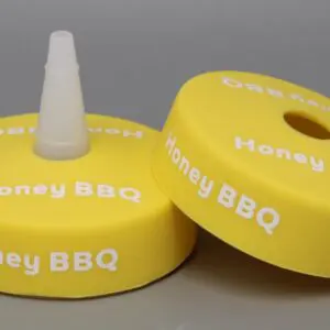Yellow Honey BBQ sauce bottle caps.