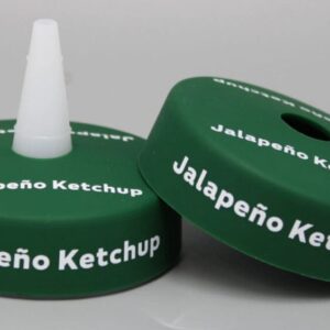 Jalapeño ketchup bottle caps on display.
