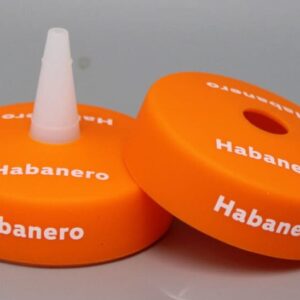 Orange Habanero bottle caps with white nozzle.