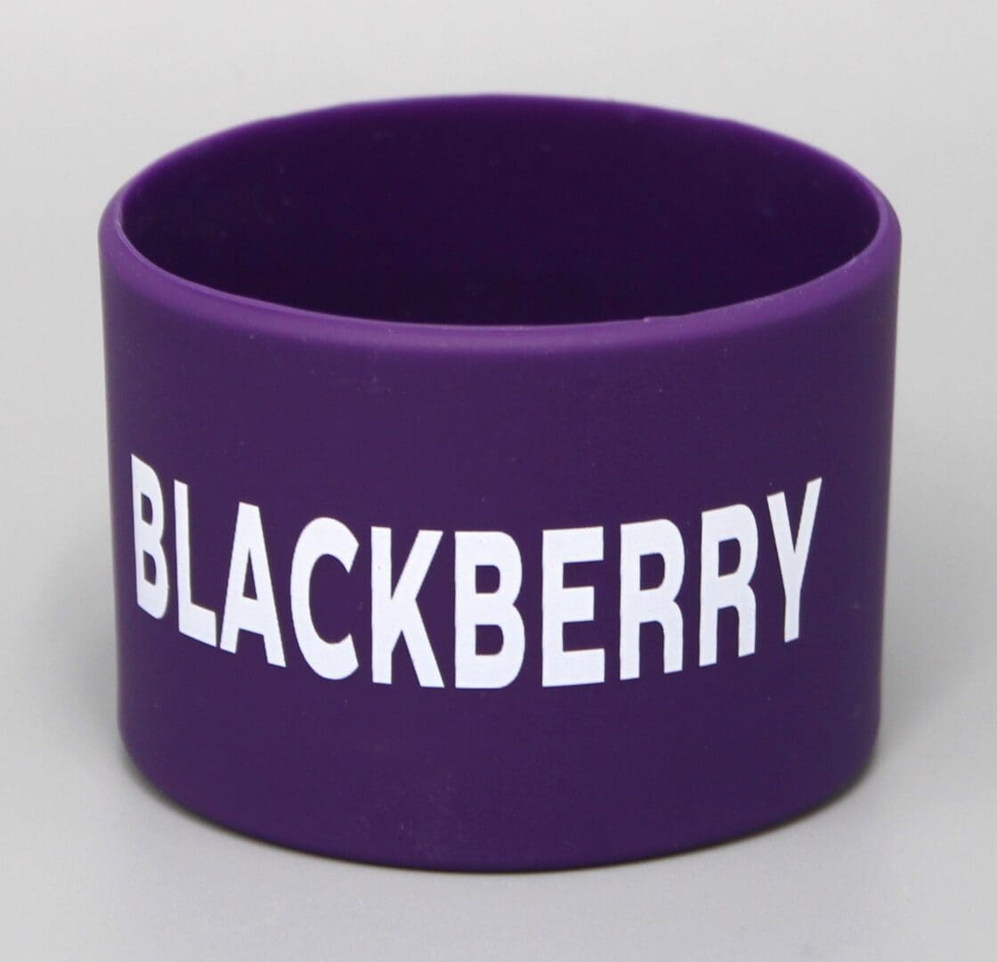 Purple wristband with "BLACKBERRY" text.