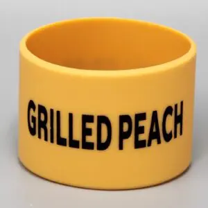 Yellow band with "Grilled Peach" text.