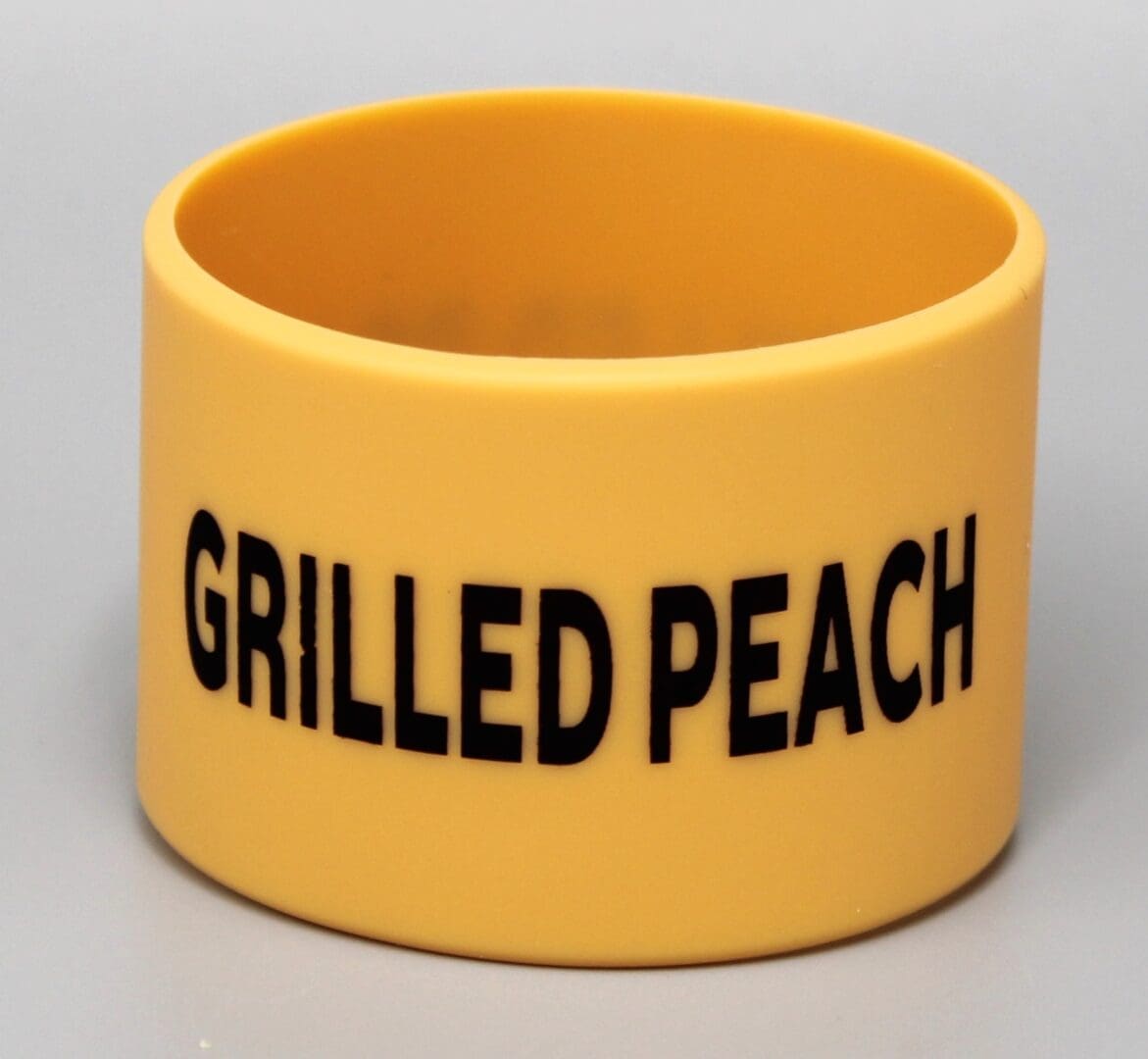 Yellow band with "Grilled Peach" text.
