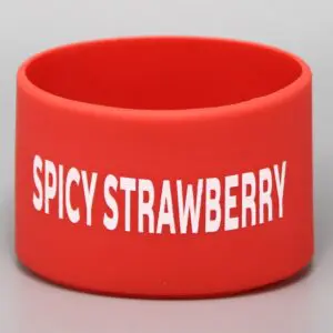 Red wristband with "Spicy Strawberry" text.