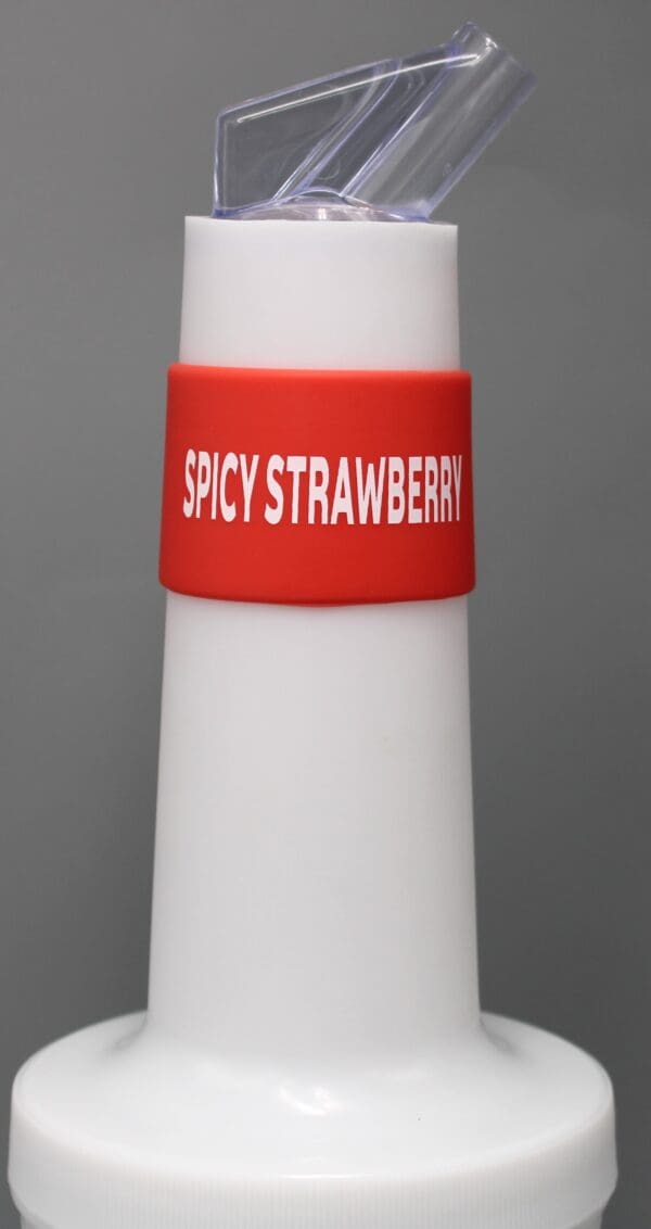 White bottle with "Spicy Strawberry" label.