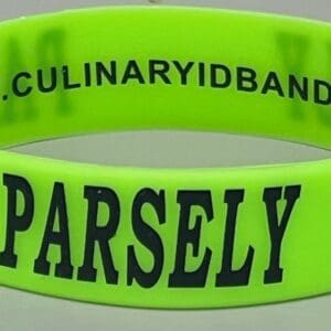 Neon green wristband with "PARSELY" text.